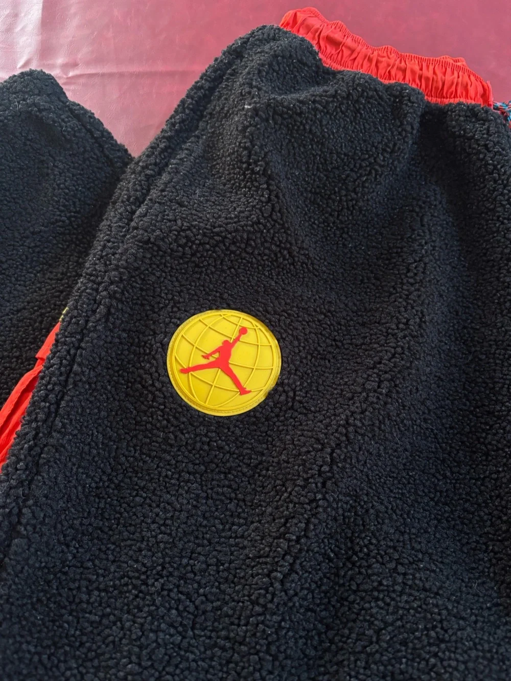 Jordan Black Sherpa Joggers with Red Waistband and Yellow Patch